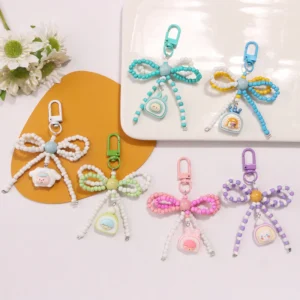 จี้โทรศัพท์รูปโบว์ลูกปัดข้าวสด จี้เคสหูฟัง จี้โทรศัพท์การ์ตูนน่ารัก