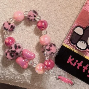 เคสโทรศัพท์ลายเสือดาวผีเสื้อพร้อมจี้รูปกล้อง